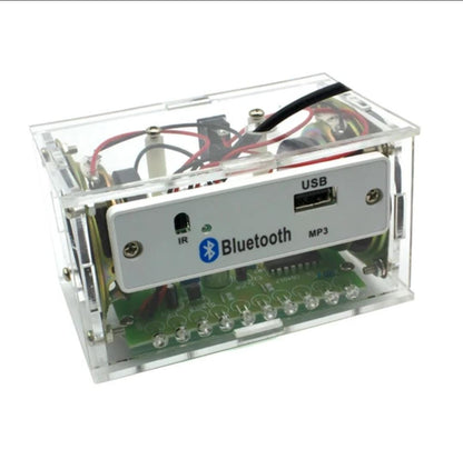 Bluetooth speaker DIY kit in clear case showing its USB front panel and internal circuit board.