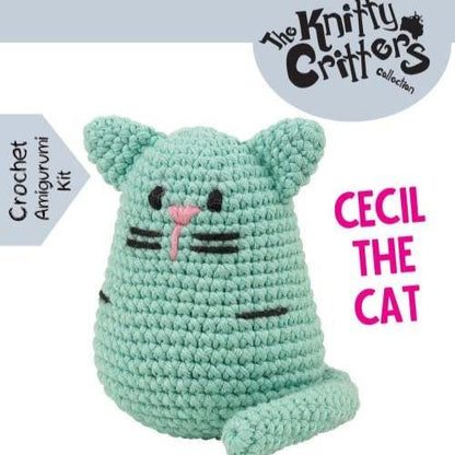 Cecil the Cat amigurumi kit design showing a mint green crocheted cat with black whiskers and pink nose.