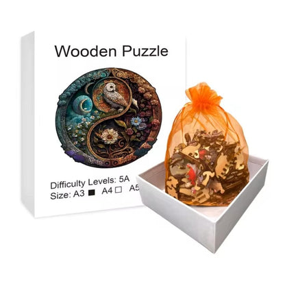 Owl wooden jigsaw puzzle gift box with shaped pieces in orange mesh pouch.