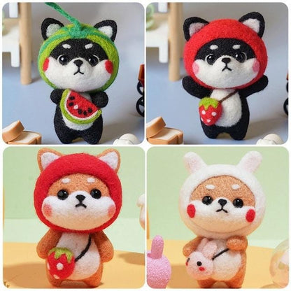 Four finished needle-felted Akita dogs with strawberry, watermelon and rabbit costume designs.