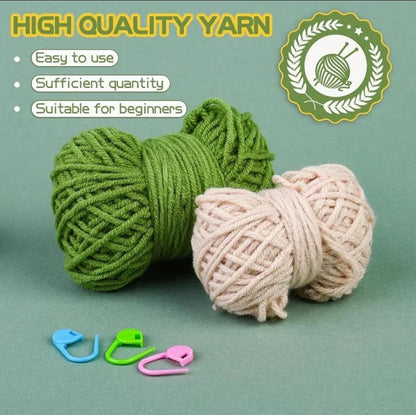 Green and cream yarn balls with three stitch markers for hanging plant crochet kit.