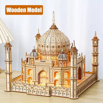 Assembled illuminated Taj Mahal wooden building model with four minarets and central dome.
