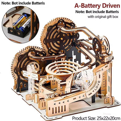 Battery-driven wooden marble run model with gear wheels and spiral track, shown with a battery compartment inset.