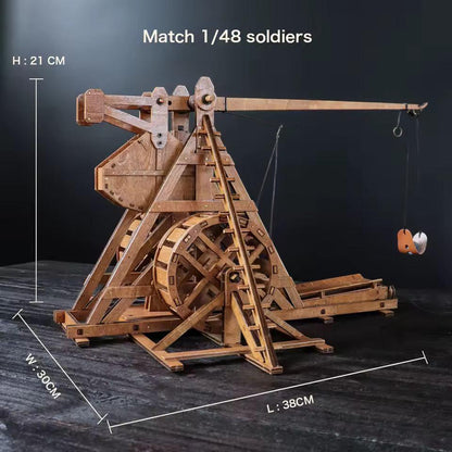Wooden trebuchet model size diagram showing 38 cm length, 30 cm width and 21 cm height.