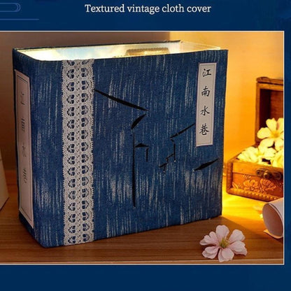 Chinese-style book nook's textured dark blue cloth-look exterior cover with vertical Chinese characters.