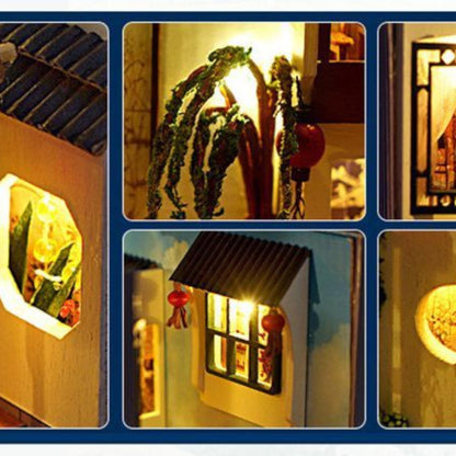 Close-up collage of tiled roofs, willow branches and warm lit windows in a Chinese-style book nook model.