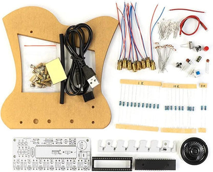 Laser harp kit parts before assembly showing acrylic panels, USB cable, wires, circuit boards and resistors.