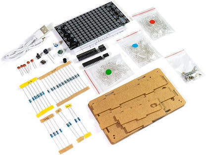 DIY LED music spectrum kit components laid out before soldering, with board, resistors, capacitors and case panels.