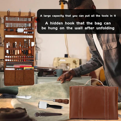 Brown leather tool storage bag hanging open on a wall with leatherworking accessories organised in rows.